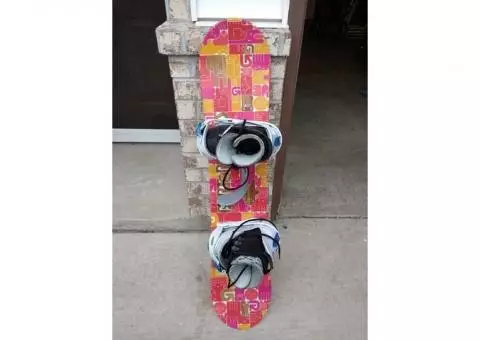 Woman's ski board with boots